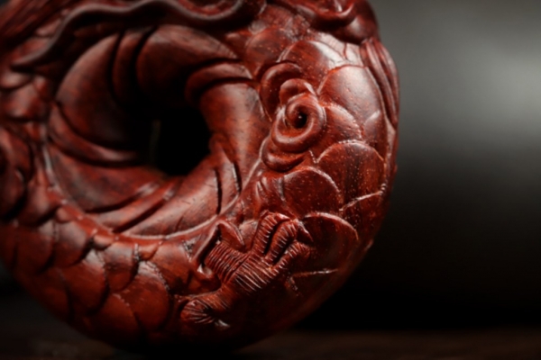 圆龙紫檀手把件